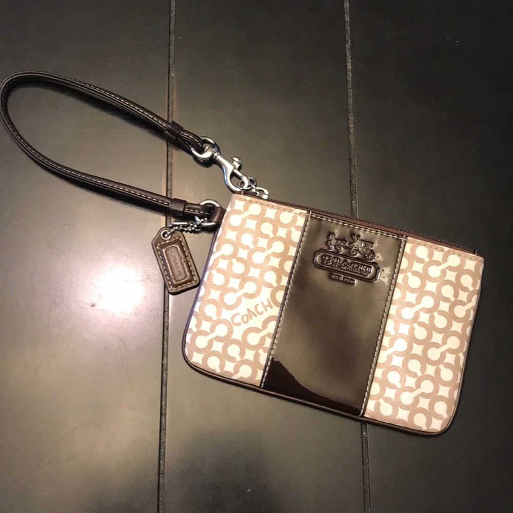 Authentic Coach brown monogram wristlet